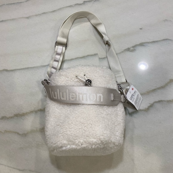 lululemon athletica Handbags - Lululemon CrossBody Bucket Bag White Opal Fleece NWT